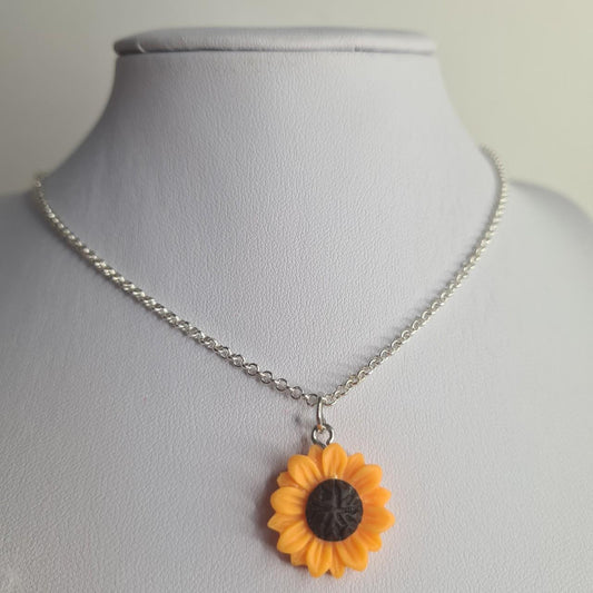 Handmade silver collar length chained necklace with blue/peach Barbie charm