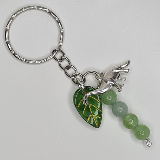 Handmade dinosaur crystal beaded leafy keyring/bag charm
