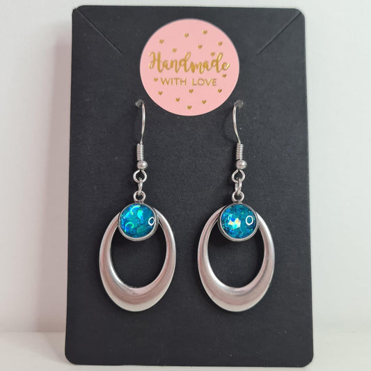 handmade oval drop with glittery resin centre hook earrings