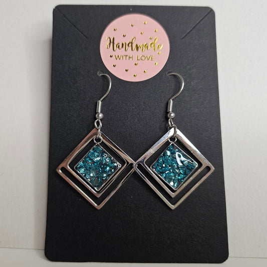handmade diamond drop with crushed crystal resin centre hook earrings
