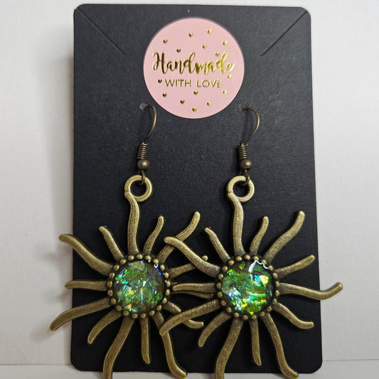 handmade brass sun with holographic glitter centre hook earrings