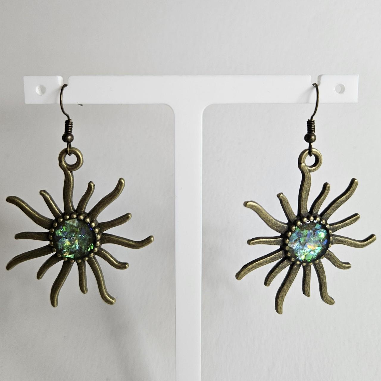 handmade brass sun with holographic glitter centre hook earrings
